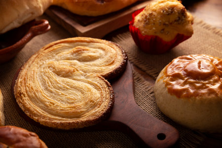 Ear. Mexican sweet bread made with puff pastry, its name comes from its shape similar to that of ears, of French origin, where it is known as Elephant Ear or Palmier Puff Pastry.の写真素材
