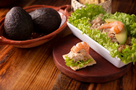 Tuna salad and shrimp canape. Delicious healthy and easy to prepare snack. Closeup.の写真素材