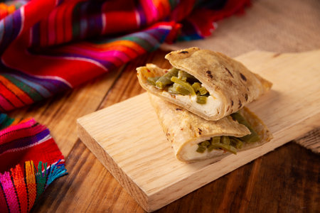 Comal Quesadilla with cheese and Nopales. Typical Mexican quesadilla made on a comal, very popular dish, one of the main street food in Mexico.の写真素材