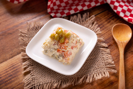 Russian Salad, also known as Oliver Salad. Very popular dish in several countries, the main ingredients are commonly potatoes, mayonnaise and vegetables such as peas, carrots, boiled eggs or chicken.の写真素材