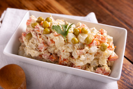 Russian Salad, also known as Oliver Salad. Very popular dish in several countries, the main ingredients are commonly potatoes, mayonnaise and vegetables such as peas, carrots, boiled eggs or chicken.の写真素材