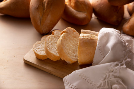 Sliced Bolillos. Traditional mexican bakery. White bread commonly used to accompany food and to prepare Mexican sandwiches called Tortas.の写真素材