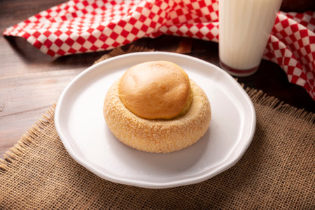 Bull's-eye. Also known as Ojo de Pancha, it is one of the traditional Mexican sweet breads, that consists of a flaky bread ring filled with an orange-flavored pound cake.の写真素材