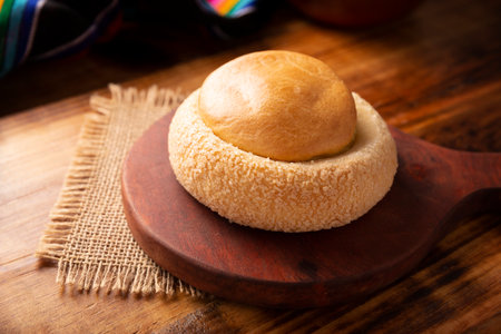 Bull's-eye. Also known as Ojo de Pancha, it is one of the traditional Mexican sweet breads, that consists of a flaky bread ring filled with an orange-flavored pound cake.の写真素材