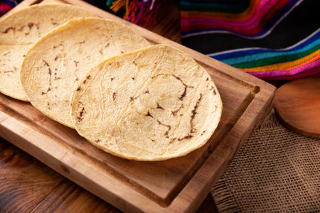 Corn Tortillas. Food made with nixtamalized corn, a staple food in several American countries, an essential element in many Latin American dishes.の写真素材