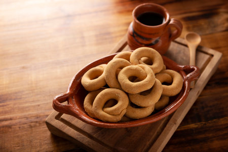 Coricos, Mexican cornmeal cookies. Also known as Harinillas de maÃ­z crudo, Tacuarines, Ensecos, Biscochuelos, Coricochis or Pemoles, accompanied by a traditional pot coffee.の写真素材