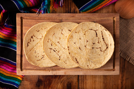 Corn Tortillas. Food made with nixtamalized corn, a staple food in several American countries, an essential element in many Latin American dishes.の写真素材