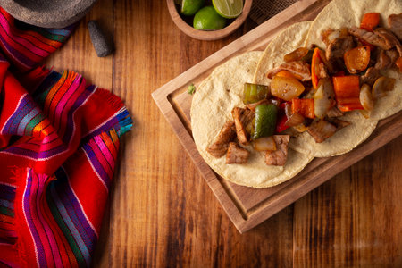 Fajitas Tacos, in Mexico it is also called Alambre de Res. Very popular recipe, the main ingredients are pieces of meat, onion, bacon and bell peppers, roasted on the grill.の写真素材