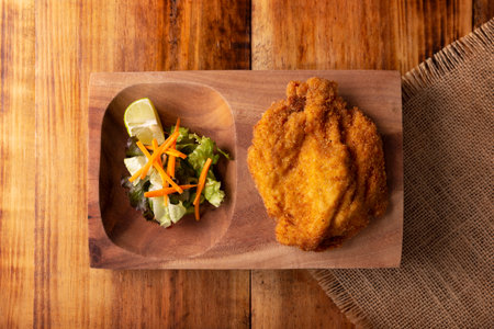 Chicken Milanese. Delicious crispy, quick and easy recipe, made with thin skinless and boneless chicken breasts or cutlets, lightly breaded and deep fried.の写真素材