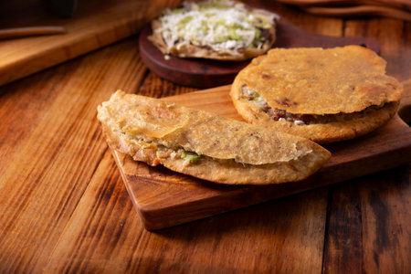 Sope, Quesadilla and Gordita. Very popular street food in Mexico known as Garnachas or Mexican Antojitos, it basically consists of fried corn dough and stuffed or covered with various ingredients.の写真素材