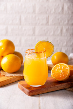 Refreshing homemade orangeade, a natural hydrating drink made from orange juice, very popular in several countries, ideal to drink in hot summers.の写真素材