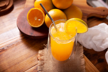 Refreshing homemade orangeade, a natural hydrating drink made from orange juice, very popular in several countries, ideal to drink in hot summers.の写真素材