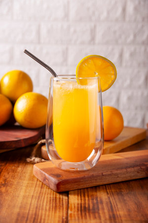 Refreshing homemade orangeade, a natural hydrating drink made from orange juice, very popular in several countries, ideal to drink in hot summers.の写真素材