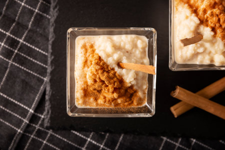 Rice pudding. Sweet dish made by cooking rice in milk and sugar, some recipes include cinnamon, vanilla or other ingredients, it is a very easy dessert to make and very popular all over the world.の写真素材