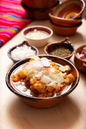 Pozole. Traditional mexican soup very popular in mexico and neighboring countries. Made from cacahuazintle corn with meat and other ingredients depending on the region.の写真素材
