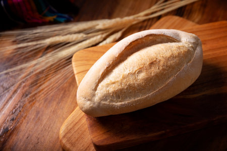 Bolillo bread. Traditional mexican bakery. White bread also called French bread commonly used to accompany food and to prepare Mexican sandwiches called Tortas.の写真素材
