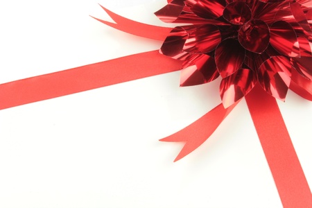 Red ribbon on whiteの写真素材