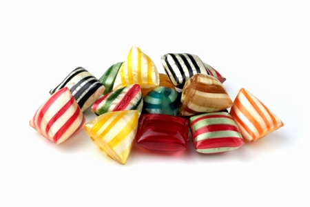 Colorful hard candies on a white backgroundの写真素材
