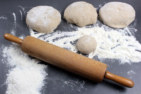 Dough, flour and rolling pin