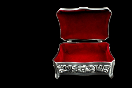 Red velvet inner side of jewelry box on black background の写真素材