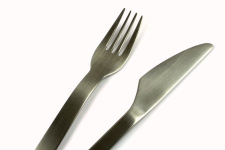 Fork and knife on white backgroundの写真素材