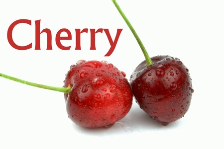 Fresh cherries with water drops and text