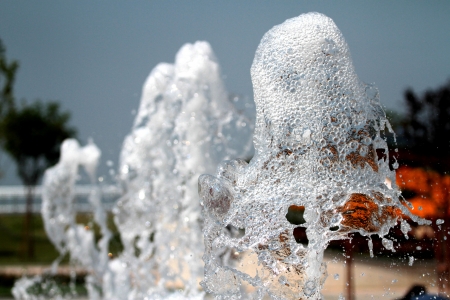 Street water fountain sparkling and splashesの写真素材