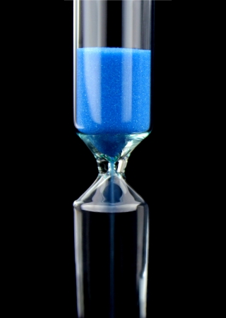 Hourglass with blue sand