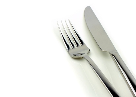 Fork and knife on white backgroundの写真素材