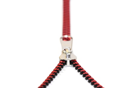 Red zipper on white backgroundの写真素材