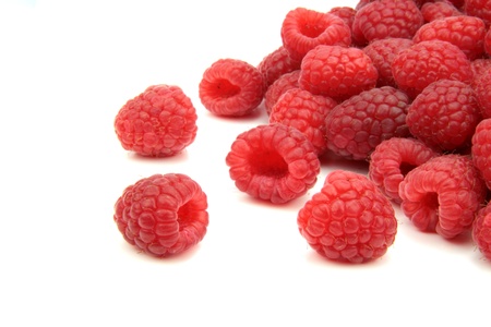 Raspberries on white background