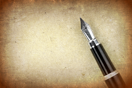 Fountain pen on a old paper with copy space  Vintage image の写真素材