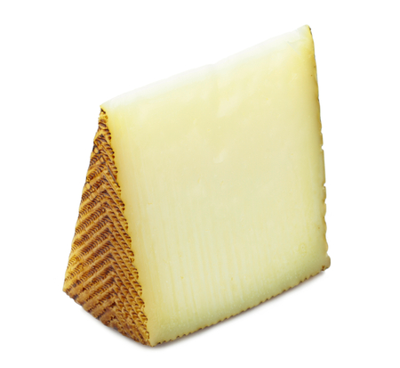 Spanish manchego cheese portion on isolated の写真素材