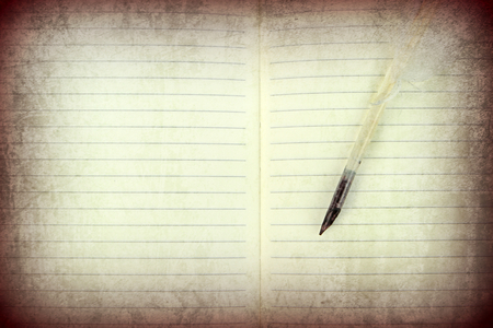 Quill pen and old notebook  Vintage style image の写真素材