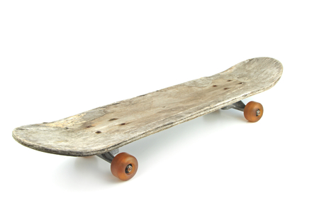 Old skateboard isolated on white backgroundの写真素材