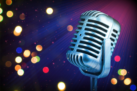 Retro microphone with stage lightsの写真素材