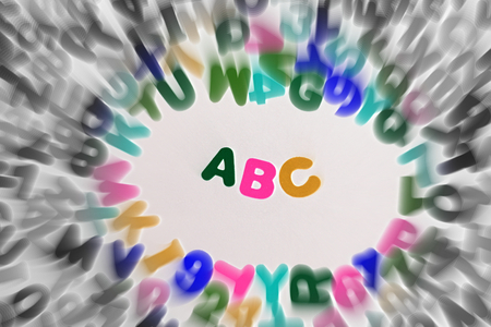 Colorful letters and numbers with zoom effectの写真素材