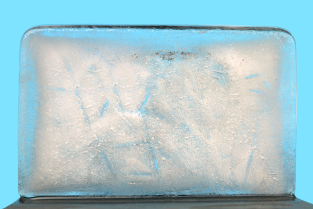 Ice texture on blue background.の写真素材