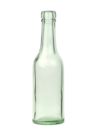 Old glass bottle isolated on white background.の写真素材