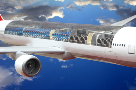 The airplane is flying in the sky and can be seen inside passenger seats