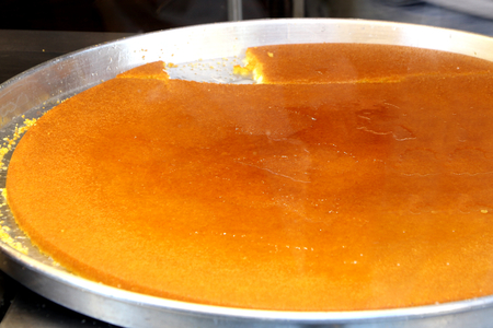 Turkish kunafa ( kunefe ) sweet. Kadaif with cheese and hot syrup . Hot eaten a sweet.