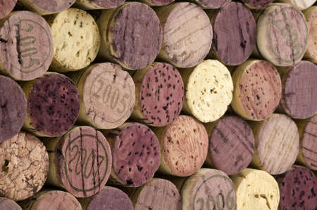 Stack of wine corks, focus on left side, right side recedes.
