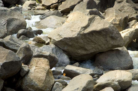 Water flowing through rocks, detail, at the base of Yosemite Falls.の写真素材