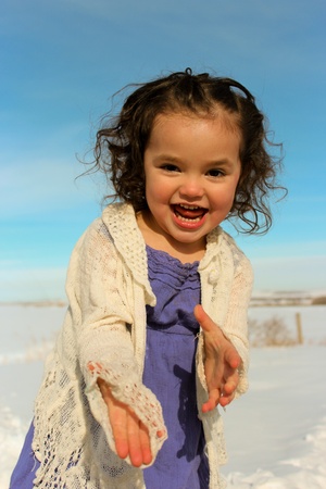Adorable toddler girl playing outsideの写真素材