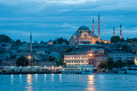 View of the Suleymaniye Mosque and Galata Bridge at sunset.の写真素材