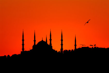 Silhouette of the Sultanahmet Mosque in Istanbul at sunsetの写真素材