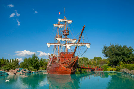 Sculpture of a pirate ship in the water of the pondの写真素材