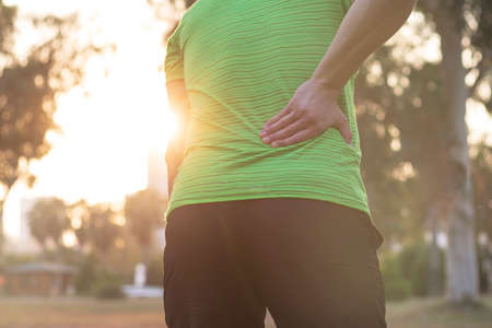 Sports injury man with back pain