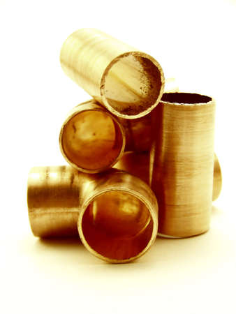 Image of pieces of copper pipe, centered.の写真素材