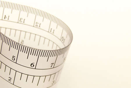Image of a transparent ruler, bending in and out of the frame.